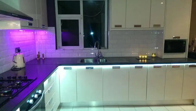 Lighting For The Kitchen Under The Cabinets And Above The Working Area: LED Strip And Surface-mounted Lamps To Illuminate The Surface Of The Kitchen Set