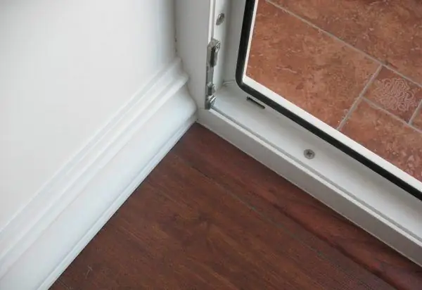 Plastic door frame with threshold