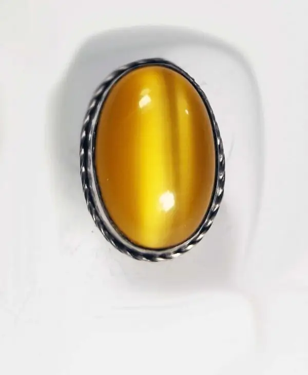 Ring med gult "Cat's eye"