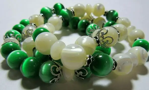 Bracelet with mother-of-pearl and green "Cat's eye"