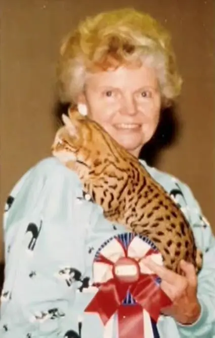 Bengal creator Jean Mill with a cat on his shoulder