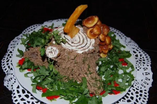 Hepatic pate laid out on a stump-shaped dish